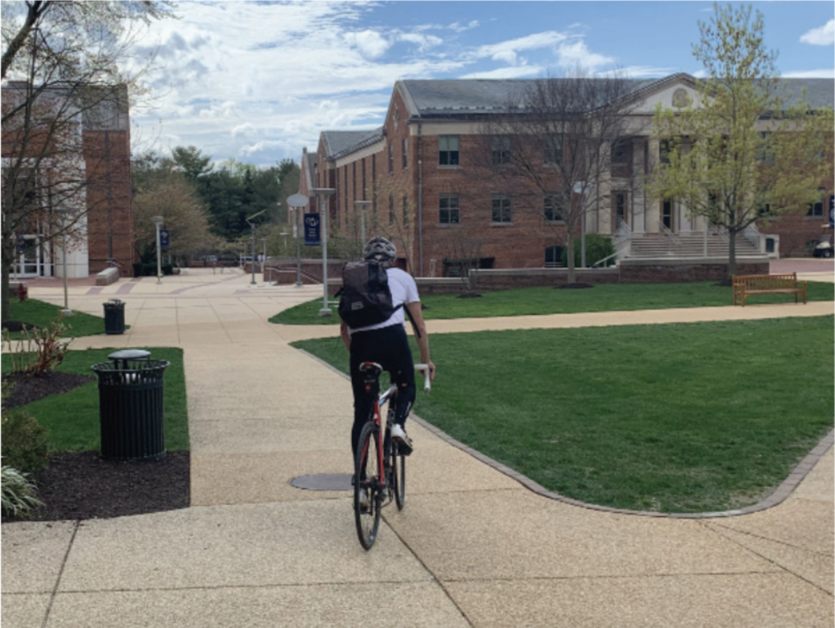 Mr. Gigot begins his daily bike ride home for one of the last times as he finishes his 13th year at Prep.